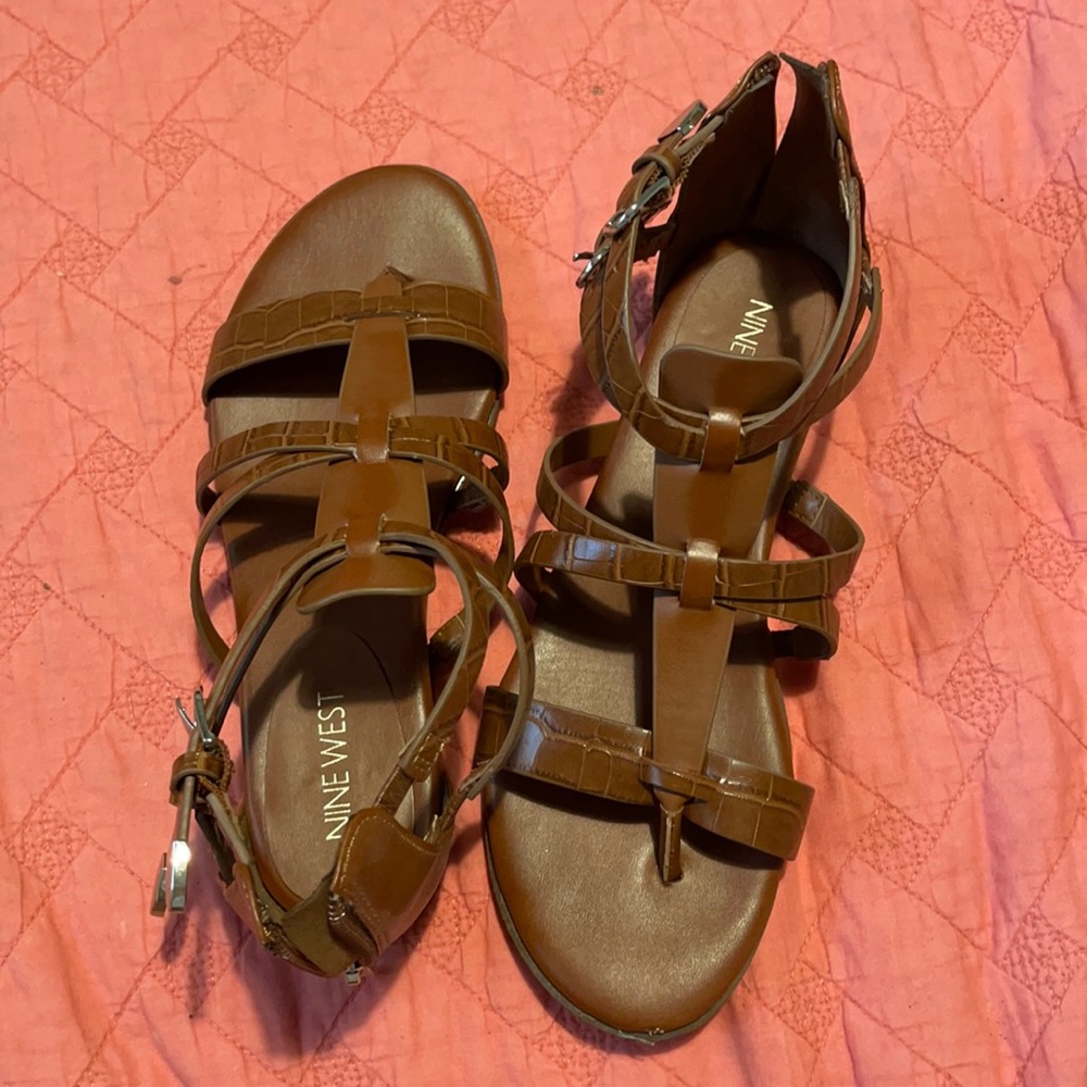 Brown strappy sandals with silver details